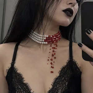 Detailed macro view of Gothic blood drop beaded choker necklace for Halloween styling