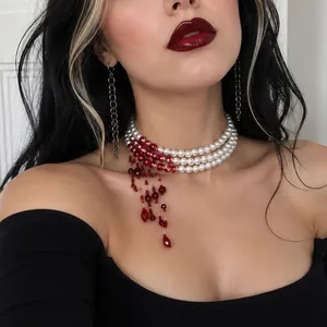 Detailed macro view of a gothic bloody pearl choker necklace for Halloween costumes