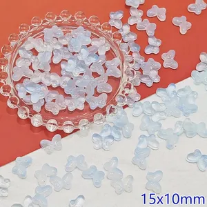 Detail view of 15x10mm translucent gradient blue butterfly glass beads for DIY jewelry