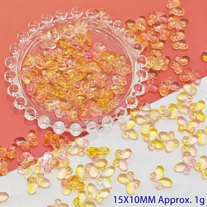 Close-up of 15x10mm gradient butterfly glass beads for DIY jewelry making