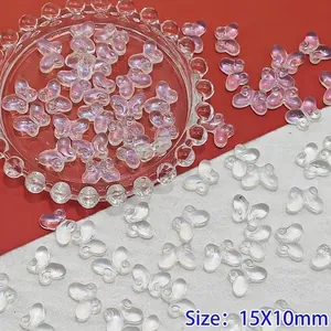 Detailed view of 15x10mm transparent gradient glass butterfly beads for DIY jewelry