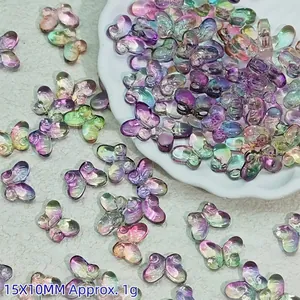 Detail view of colorful 15x10mm gradient glass butterfly beads for DIY jewelry craft