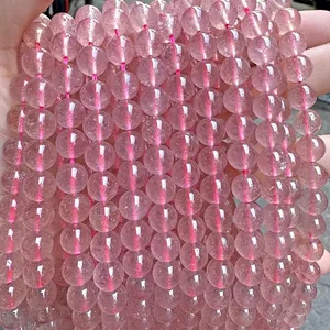 Macro view of translucent pink natural stone round beads for jewelry DIY bracelets.
