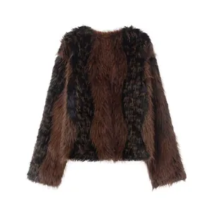 Detailed view of fashionable brown and black striped faux fur short jacket for winter