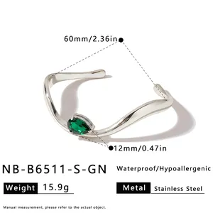 Silver finish stainless steel cuff bracelet with green pear-shaped zircon stone detail.