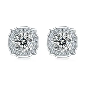 Detailed macro shot of sparkling square moissanite halo stud earrings in premium silver