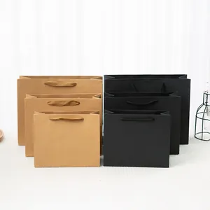 Sacchetti regalo di lusso in carta Kraft e neri con robusti manici in varie dimensioni