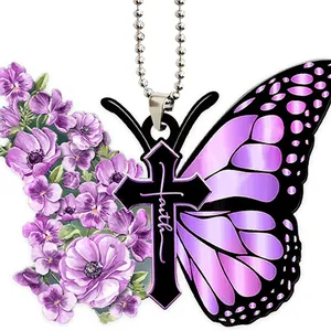 Detail of butterfly cross car hanging ornament with purple flowers and faith text