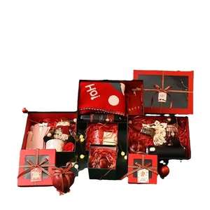 Luxe Christmas gift boxes set with transparent windows and festive red ribbons