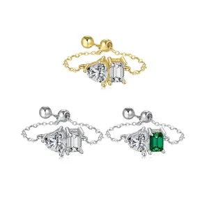 Adjustable chain rings with heart and emerald cut stones in gold and silver finishes