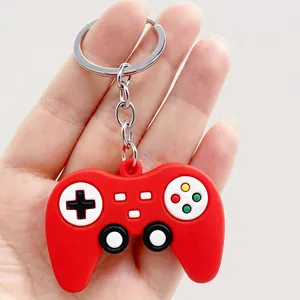 Close-up of red soft rubber game controller keychain with colorful buttons details