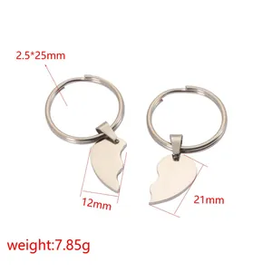 Close-up detail of silver split heart keychain set showing dimensions and total weight
