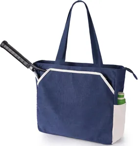 Spacious navy blue canvas tennis tote bag featuring a racket pocket and side bottle holder