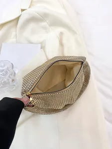Bolso de mano de noche brillante con pedrería champán y cierre de cremallera