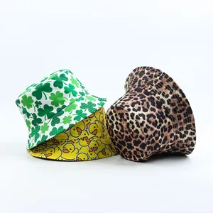 Close-up of stylish bucket hats featuring clover, duck, and leopard print designs.