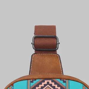 Close-up detail of canvas ethnic chest bag with an adjustable metal buckle strap