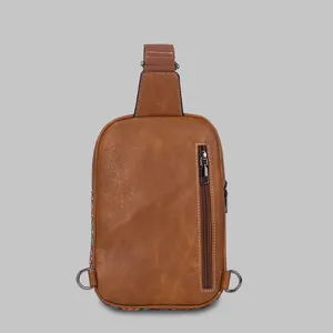 Back view of brown PU leather chest bag featuring canvas trim and metal D-ring details