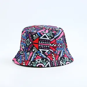 Double-sided bucket hat with vibrant geometric ethnic print patterns in multi-colors