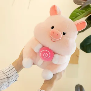 Cute pink pig plush toy holding a lollipop, soft stuffed animal for kids gift.
