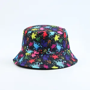 Colorful splatter print bucket hat in vibrant streetwear style with black base