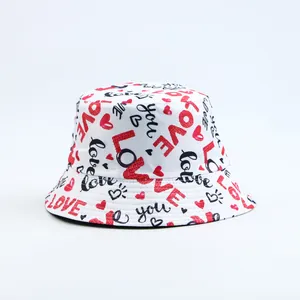 Close-up of the romantic LOVE print on this stylish white bucket hat for women.