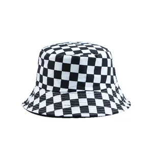 Black and white checkered bucket hat for outdoor sun protection and casual street style.
