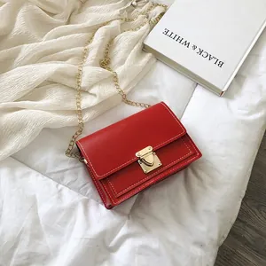 Red PU leather square crossbody bag with gold chain strap and stylish insert lock detail