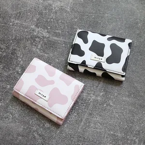 Cute mini tri-fold cow print pattern wallet and card holder for women in pink and black