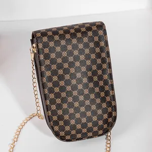Vintage brown phone crossbody bag with clover monogram pattern and gold chain strap
