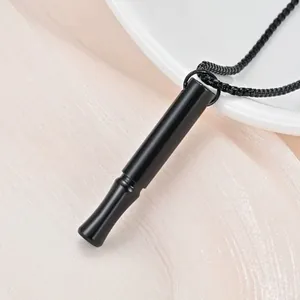 Sleek black meditation breathing necklace with a cylindrical anxiety relief whistle pendant
