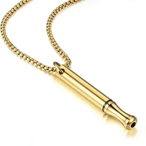 Gold-colored meditation breathing necklace with cylindrical whistle pendant on box chain