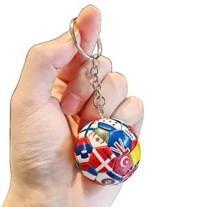Soccer ball keychain with colorful national flag patterns for sports fans