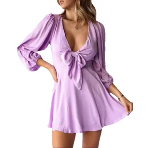 Elegant lavender deep V-neck mini dress with puff sleeves and front bow tie accent