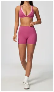 Professional naked feeling high waisted yoga shorts and sports bra set in vibrant pink