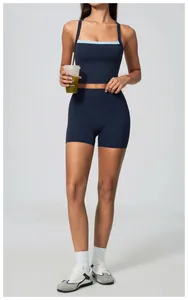 Close-up detail of women's navy blue high-waisted quick-dry yoga shorts on model