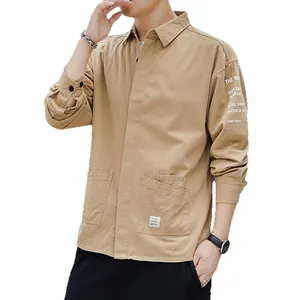 Classic men's khaki durable workwear shirt jacket featuring dual front utility pockets