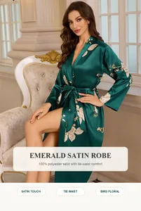 Luxurious emerald green satin robe featuring elegant bird and floral prints with tie-waist