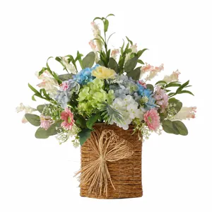 Close-up of vibrant artificial flower arrangement in a woven brown wicker basket