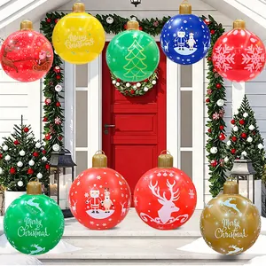 Outdoor inflatable Christmas balls with various holiday patterns for festive courtyard decor