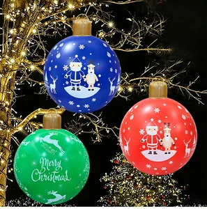 Three colorful inflatable Christmas balls with Santa and reindeer patterns for outdoor decor