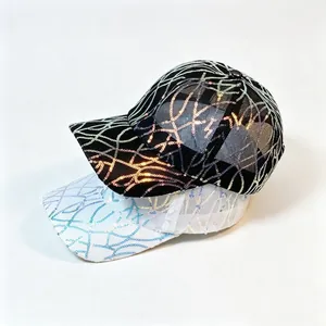 Detail of two baseball caps with holographic sequin wave patterns on breathable mesh fabric.