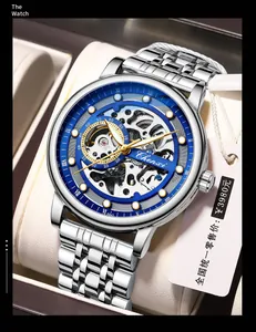 Detailed macro view of silver men's skeleton automatic watch with a blue dial ring