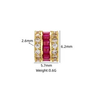 Close-up of gold-plated spacer bead with red and clear crystals, 5.7x6.2mm
