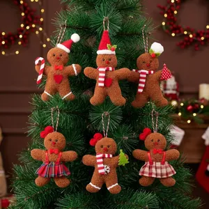 Charming plush gingerbread man ornaments set displayed on a festive green Christmas tree