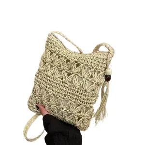 Handmade crochet hollow-out crossbody phone bag with decorative tassels