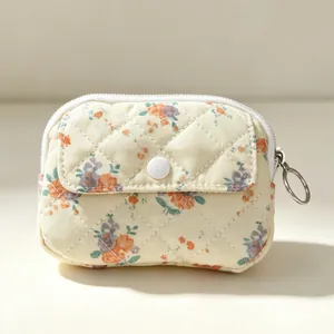 Mini estuche acolchado de flores para auriculares y monedero con cremallera y broche