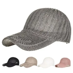 Detail view of knitted hollow-out baseball caps in various colors for sun protection.