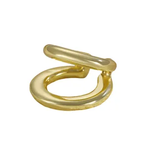 High-quality close-up of a minimalist gold-plated multi-layer ear cuff for non-pierced ears.
