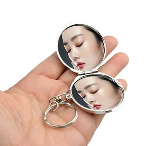 Llavero de espejo de maquillaje de metal redondo de doble cara portátil compacto para mujer