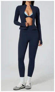 Full view of women's navy blue zippered sports jacket and high-waisted yoga leggings set.